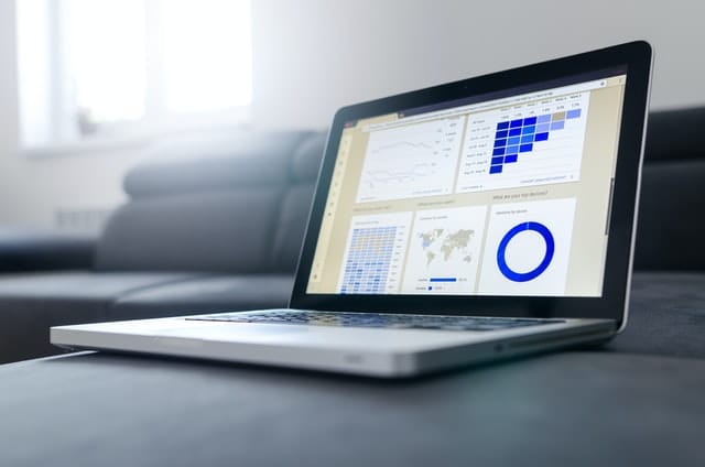 Laptop with email marketing statistics.